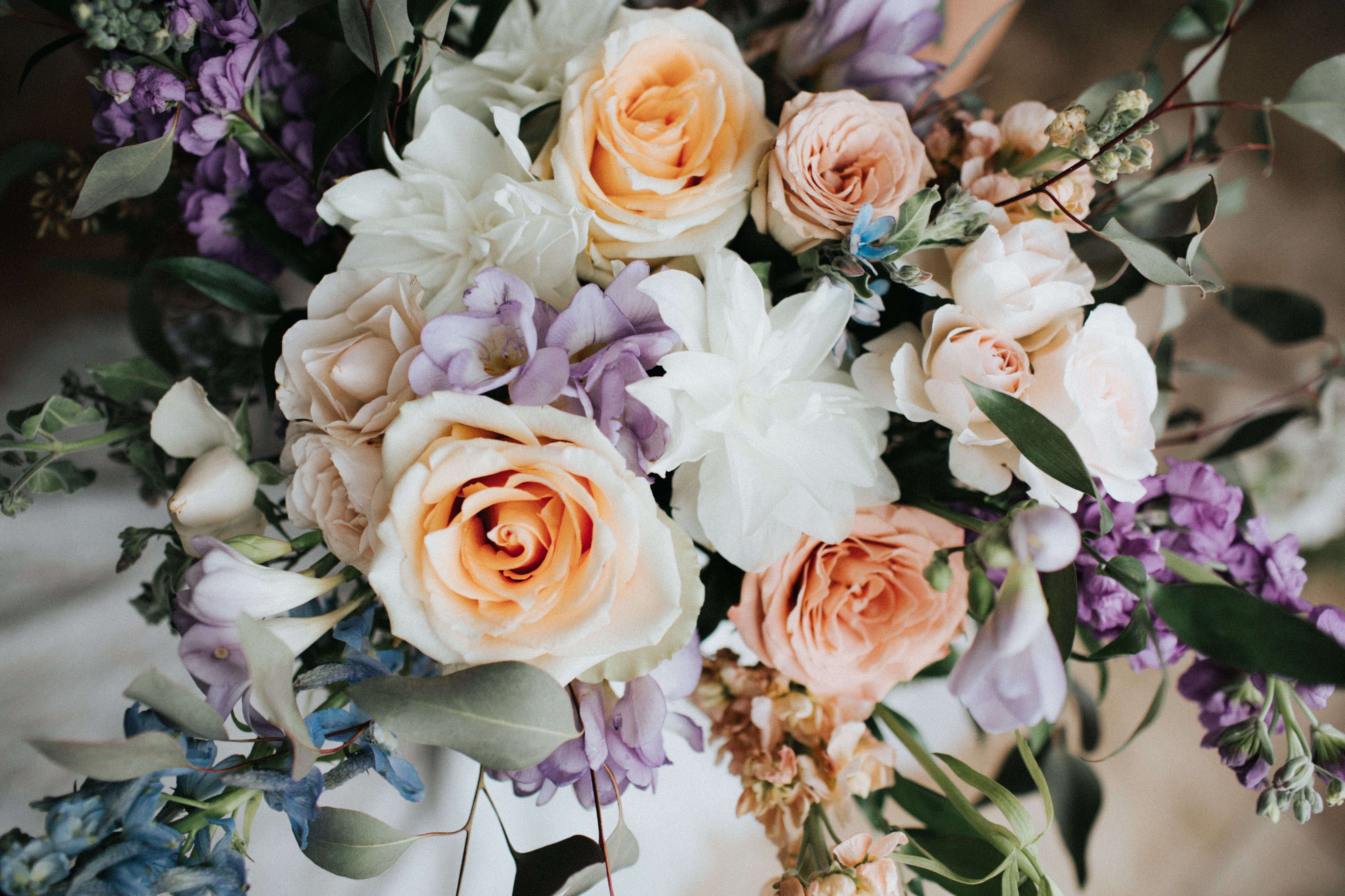 peach, white, and lavender wedding bouquet